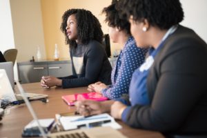 Black woman talking in meeting